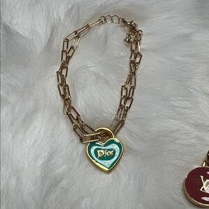 Goldtone bracelet with Teal Heart Dior Pendant